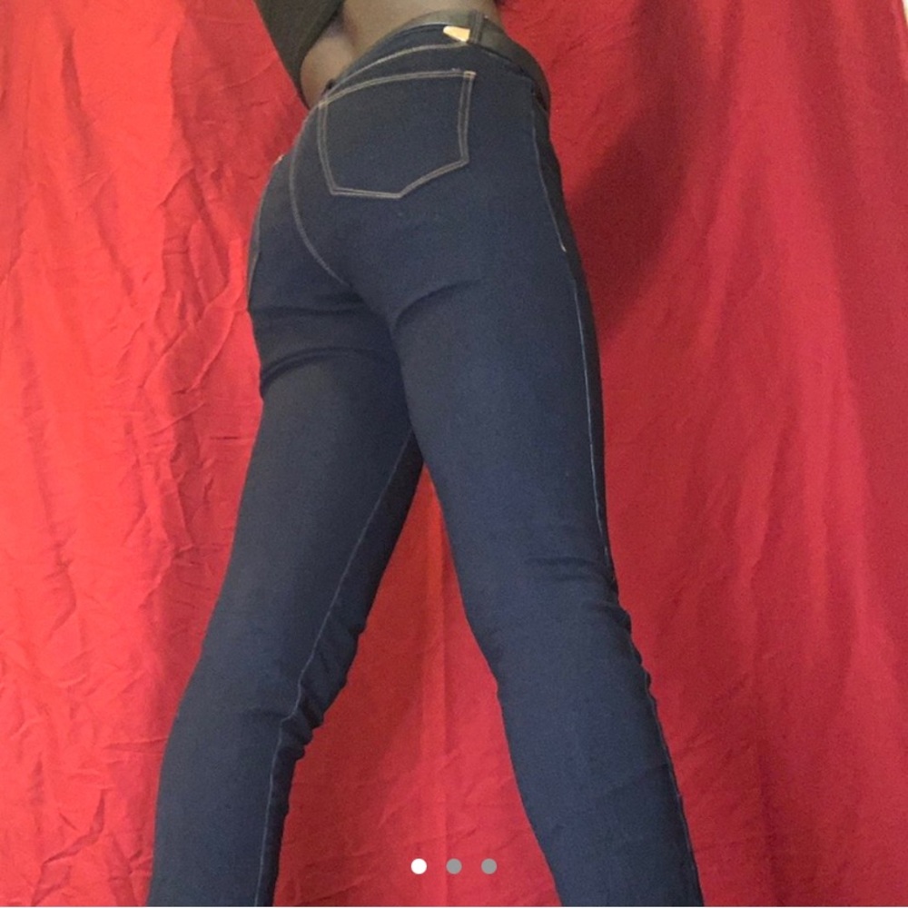 Dark wash skinny jeans.